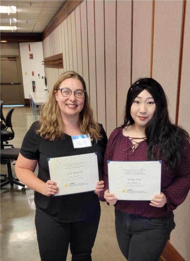 Diane Lim holding certificate