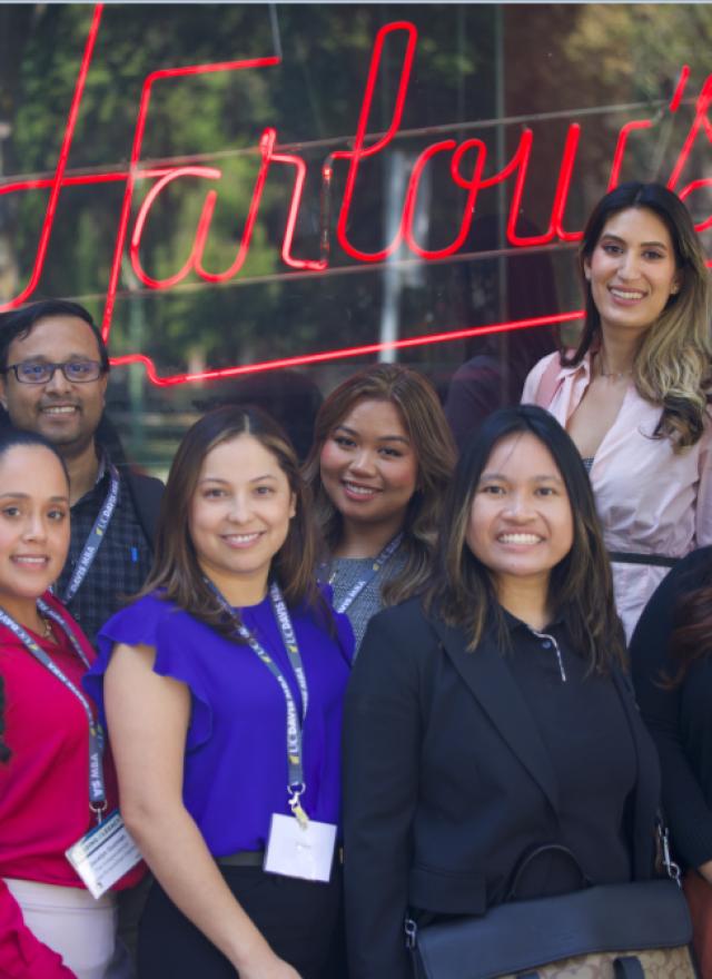 A group of Sac MBA students outside a restaurant in midtown Sacramento