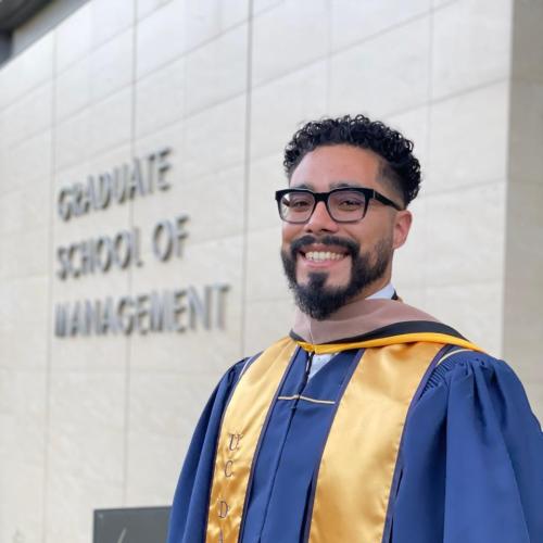 Antonio Hurtado standing in front of Gallagher Hall